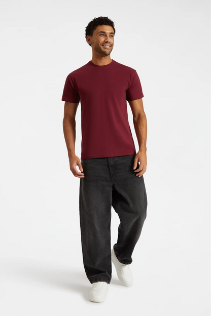 Model wearing Uneek UC301 Classic T-shirt