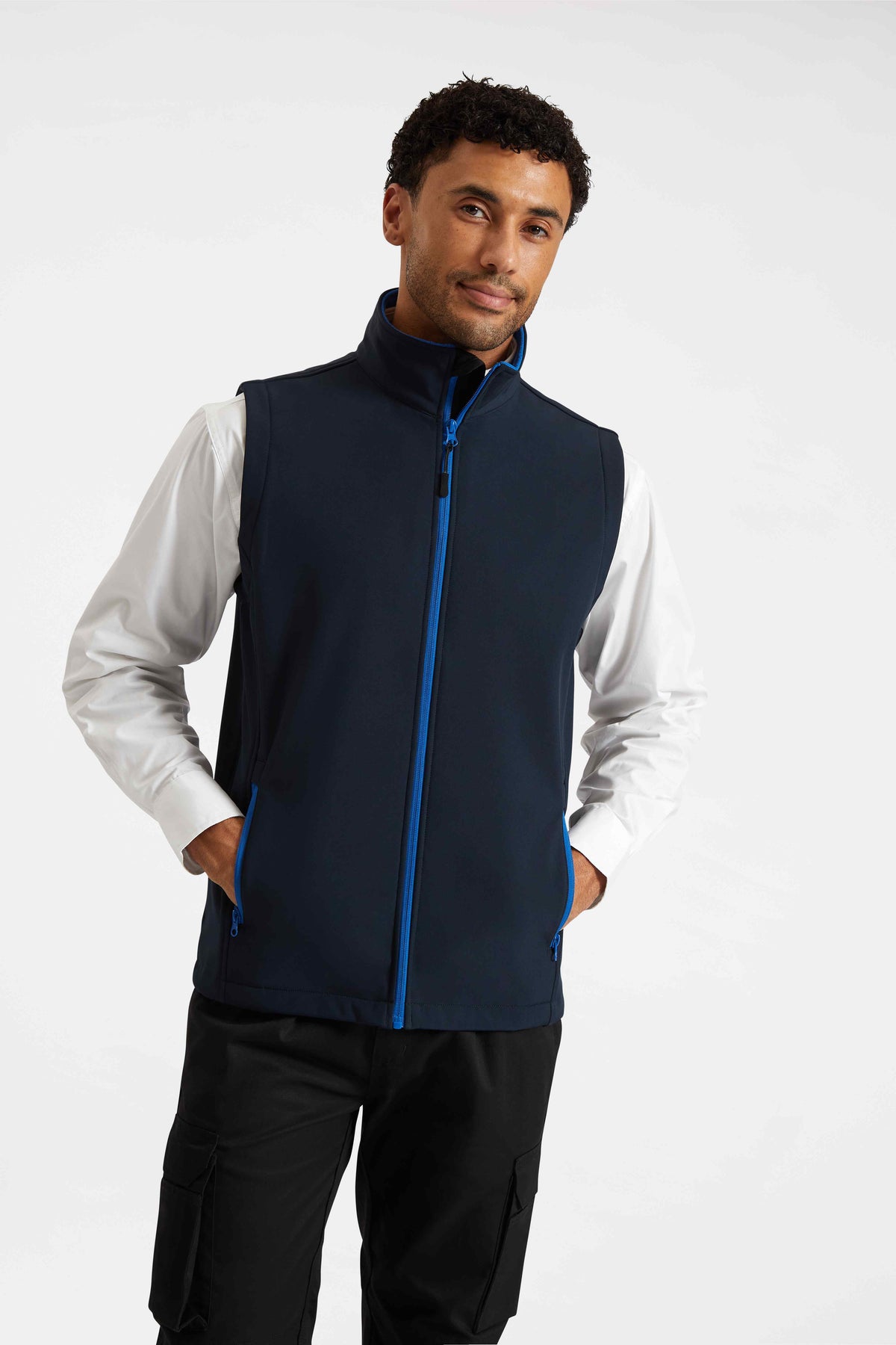 Model wearing Uneek UC614 Printable Softshell Gilet