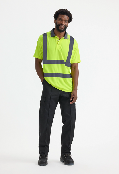 Model wearing Uneek UC808 Hi Vis Short Sleeve Polo Shirt